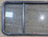 Used Black Radius Emergency Opening Window : 57 1/2" W x 21 3/4" H x 1 1/4" - Young Farts RV Parts