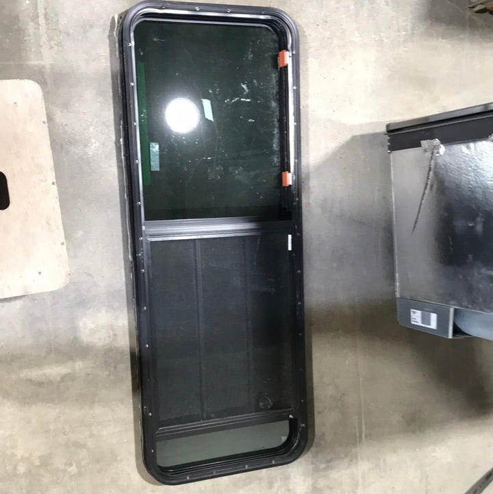 Used Black Radius Emergency Opening Window : 59 1/2" W X 21 3/4" H X 2" D - Young Farts RV Parts