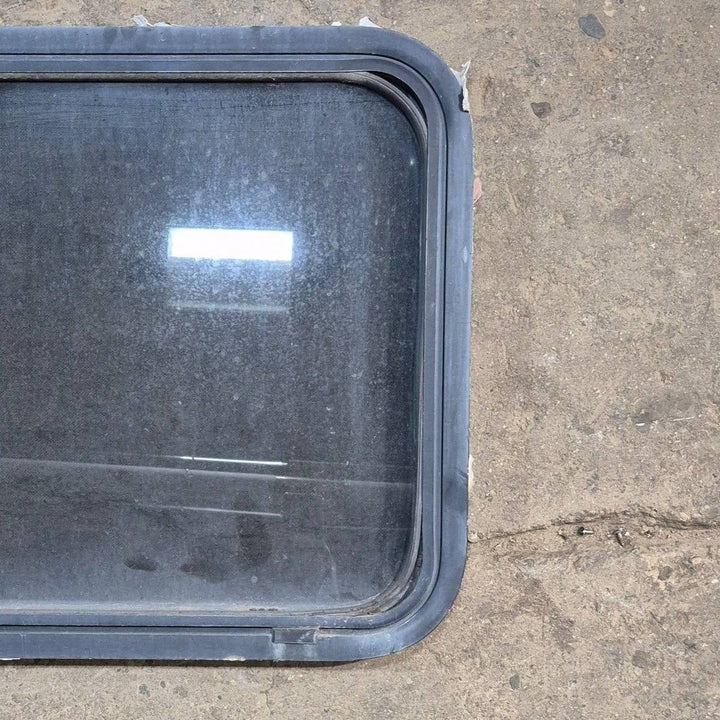 Used Black Radius Emergency Opening Window - 60 X 21.75 X 1.875 - Young Farts RV Parts