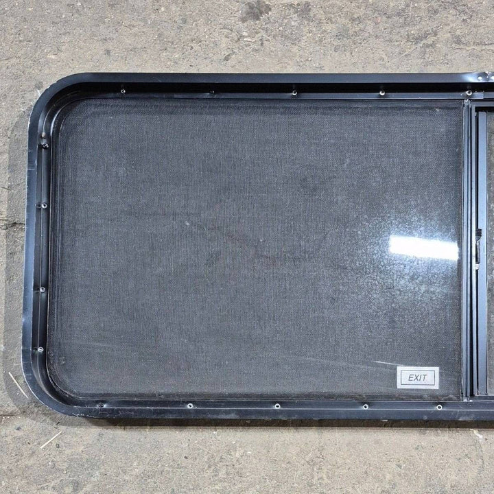 Used Black Radius Emergency Opening Window - 60 X 21.75 X 1.875 - Young Farts RV Parts