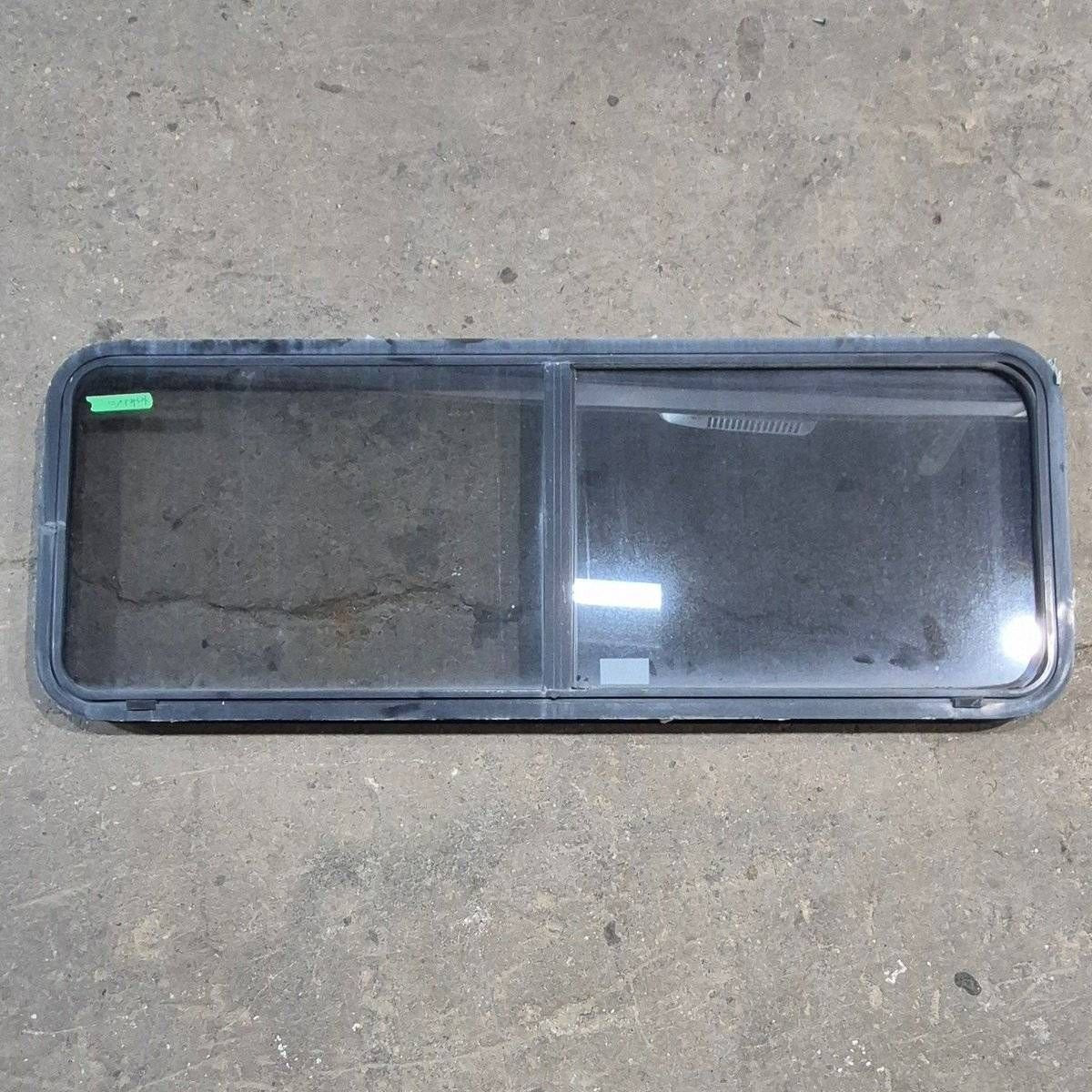 Used Black Radius Emergency Opening Window - 60 X 21.75 X 1.875 - Young Farts RV Parts