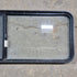 Used Black Radius Emergency Opening Window - 60.25 X 21.75 X 1.75 - Young Farts RV Parts