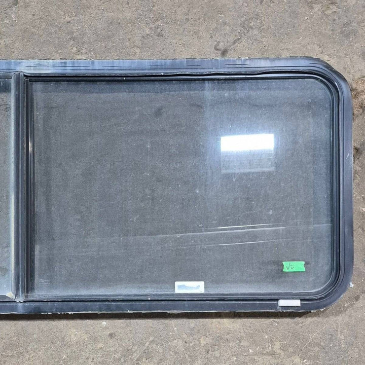 Used Black Radius Emergency Opening Window - 60.25 X 21.75 X 1.75 - Young Farts RV Parts