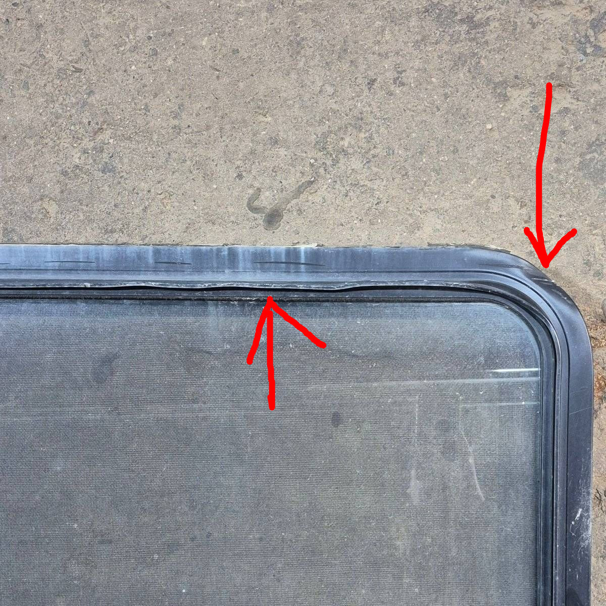 Used Black Radius Emergency Opening Window - 60.25 X 21.75 X 1.75 - Young Farts RV Parts