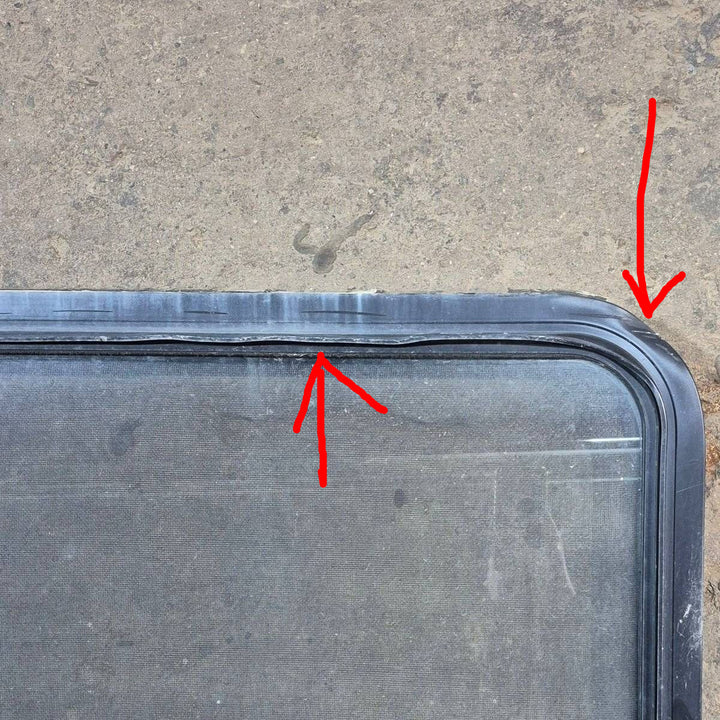 Used Black Radius Emergency Opening Window - 60.25 X 21.75 X 1.75 - Young Farts RV Parts