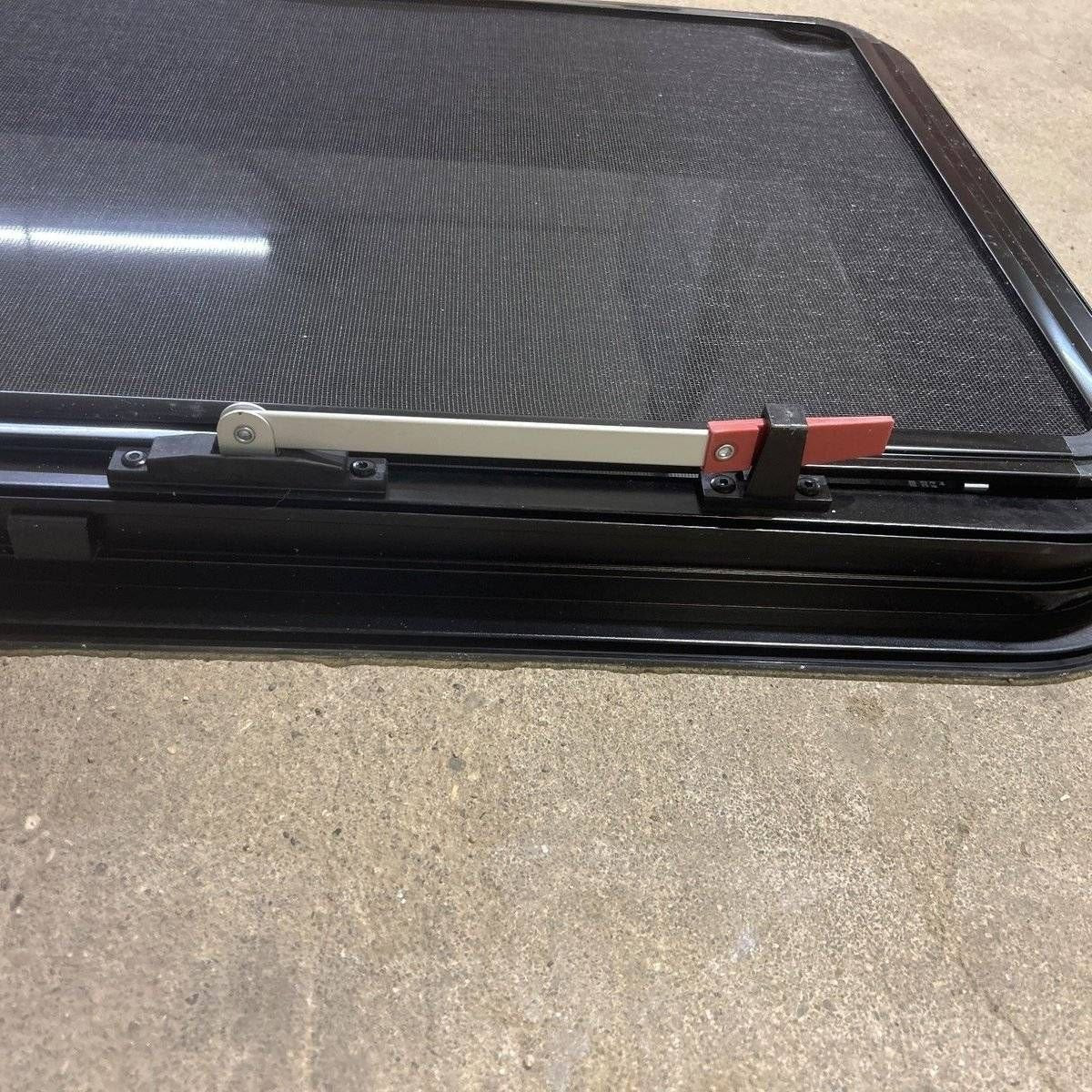 Used Black Radius Frameless Emergency Opening Window : 29 1/2