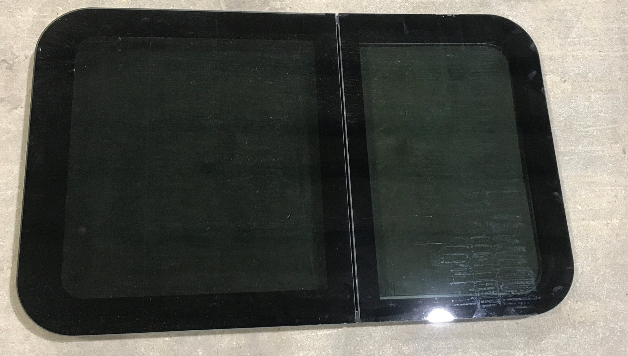 Used Black Radius Frameless Opening Window : 39 1/4 X 23 1/2 X 1 1/2" D - Young Farts RV Parts