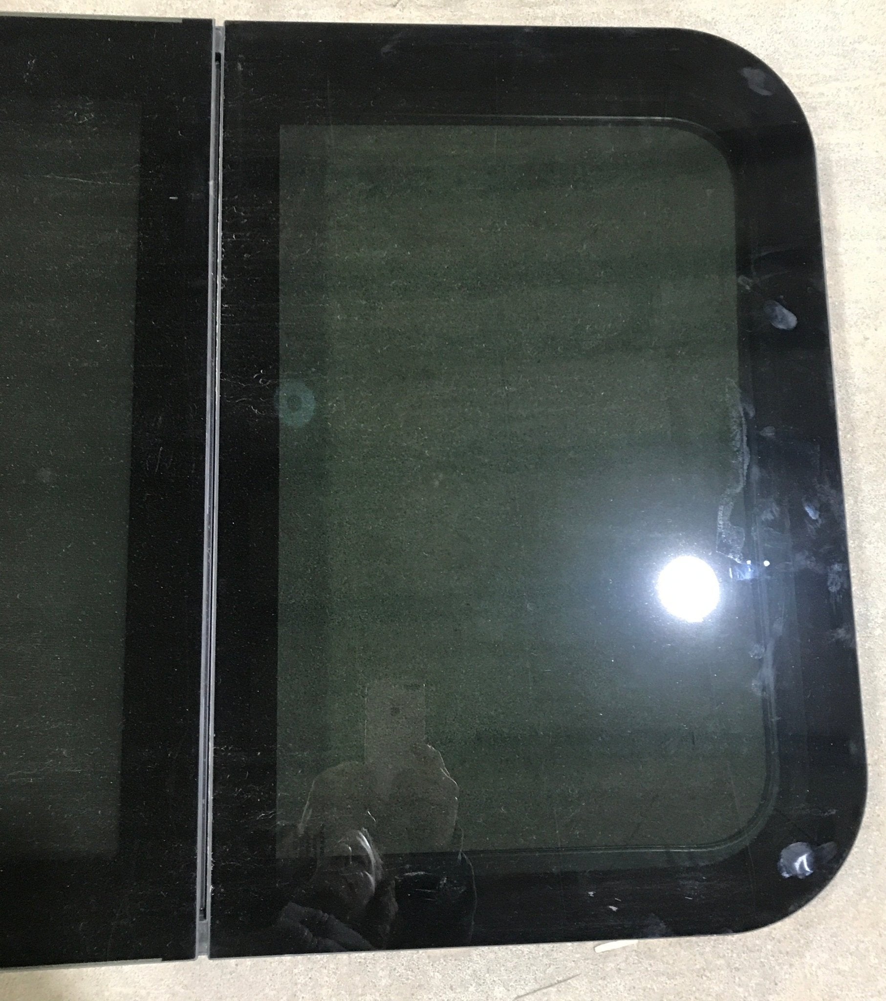 Used Black Radius Frameless Opening Window : 39 1/4 X 23 1/2 X 1 1/2" D - Young Farts RV Parts