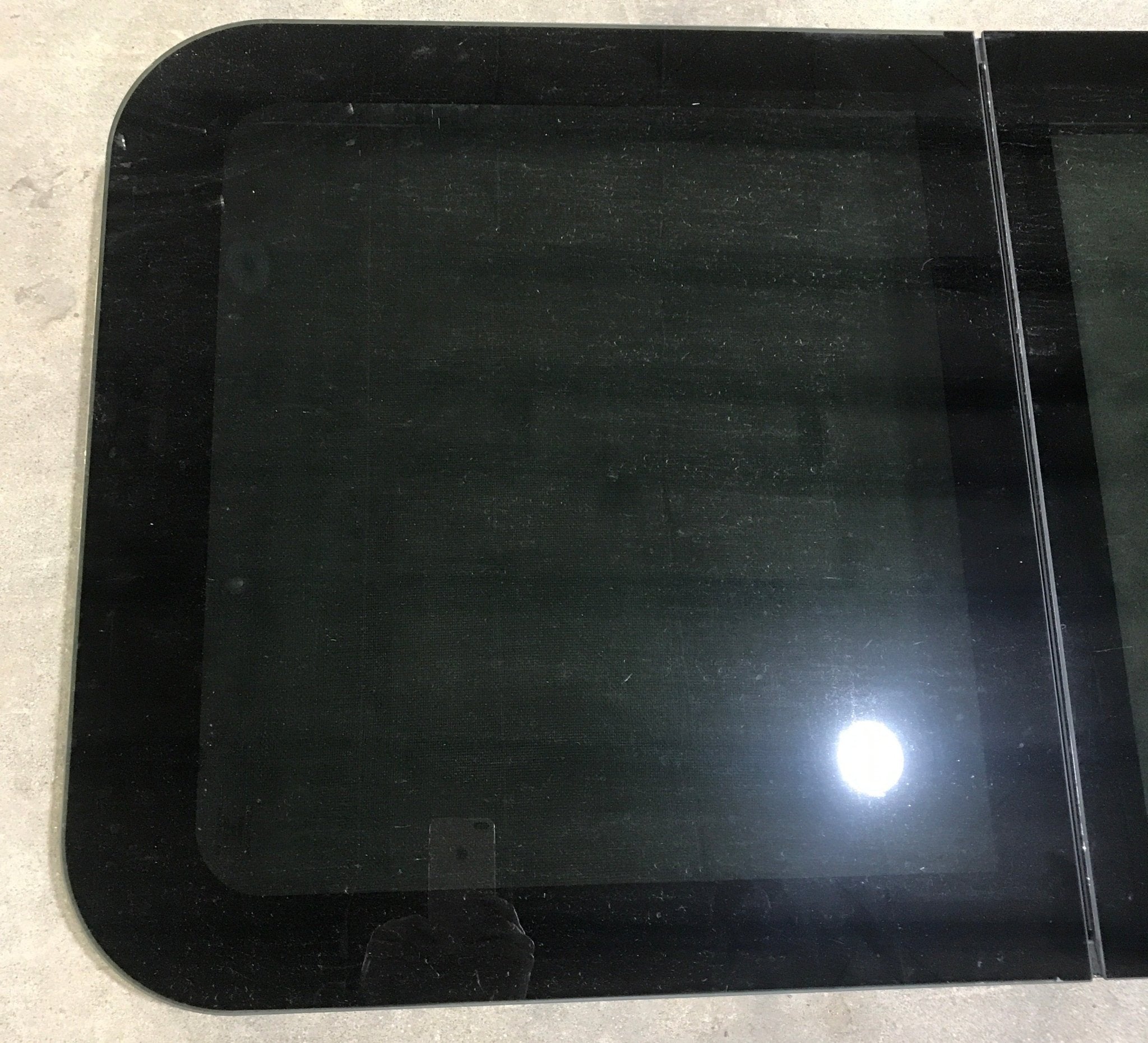 Used Black Radius Frameless Opening Window : 39 1/4 X 23 1/2 X 1 1/2" D - Young Farts RV Parts