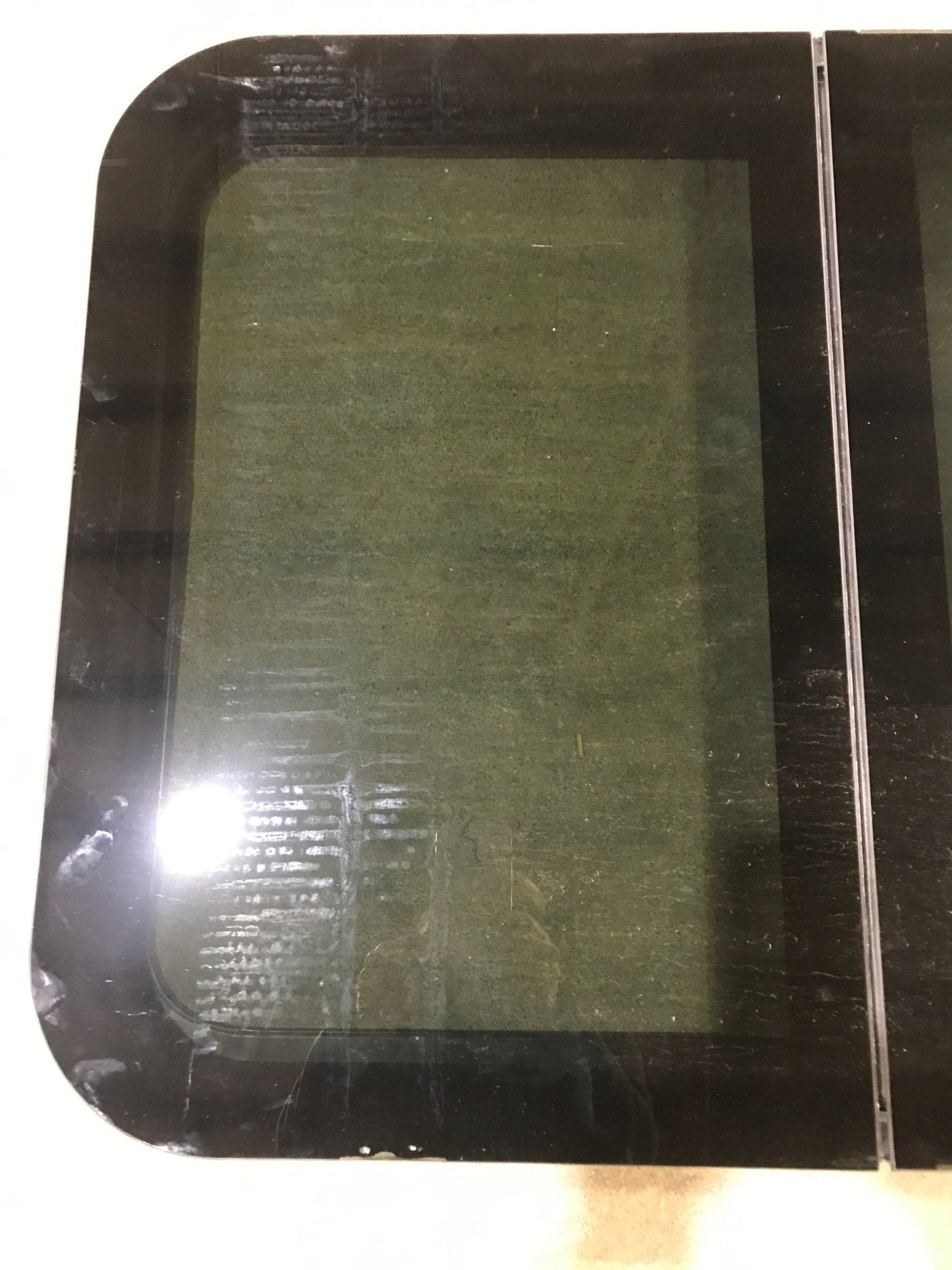 Used Black Radius Frameless Opening Window : 39 1/4 X 23 1/2 X 1 1/2" D - Young Farts RV Parts