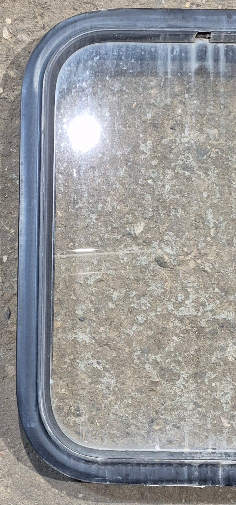 Used Black Radius Non Opening Window : 17 1/2" W x 21 1/4" H x 1 7/8" - Young Farts RV Parts