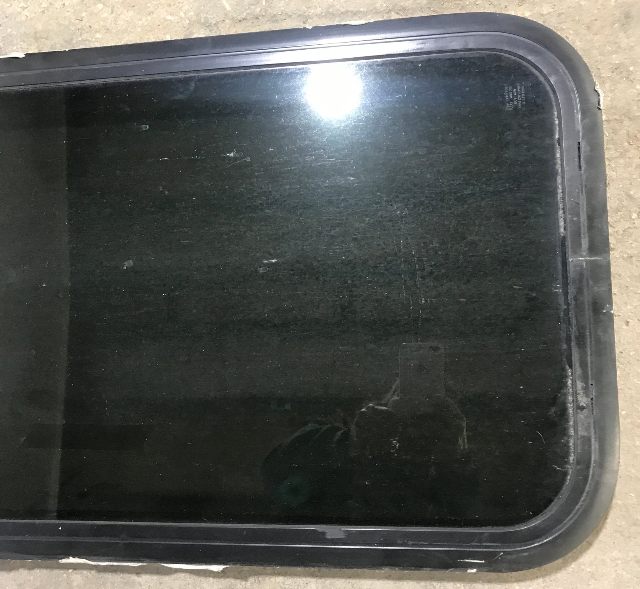 Used Black Radius Non Opening Window : 17 1/2" W x 39 1/2" H x 1 7/8" D - Young Farts RV Parts
