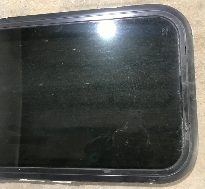 Used Black Radius Non Opening Window : 17 1/2" W x 39 1/2" H x 1 7/8" D - Young Farts RV Parts