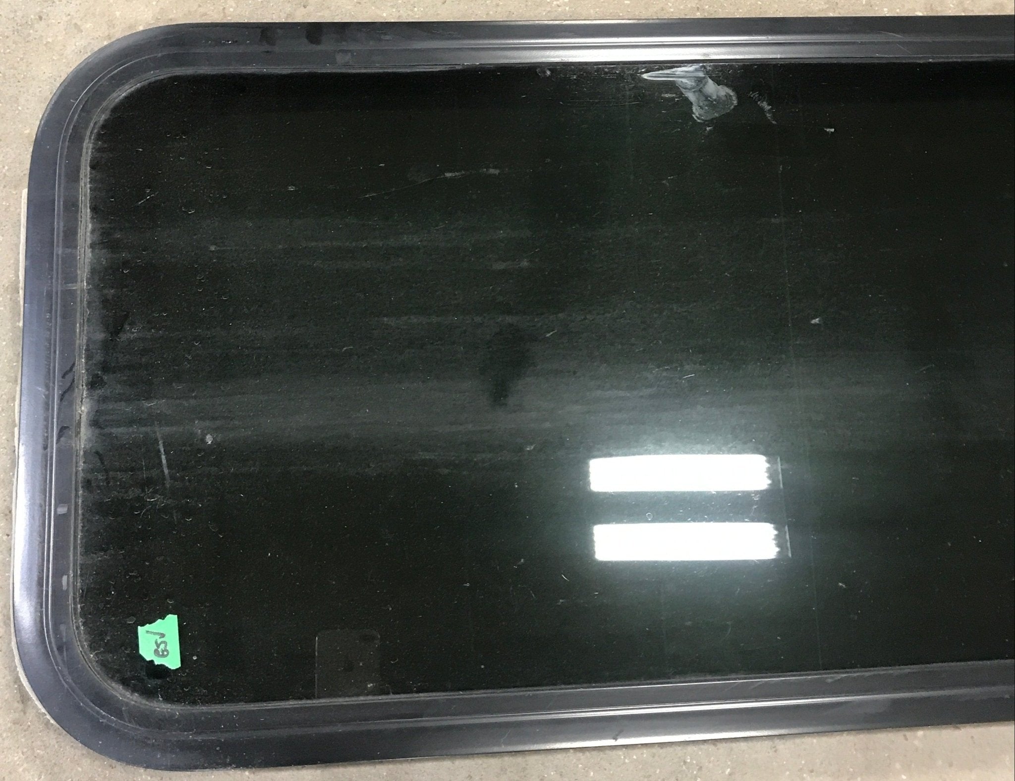 Used Black Radius Non Opening Window : 17 1/2" W x 39 1/2" H x 1 7/8" D - Young Farts RV Parts