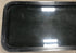 Used Black Radius Non Opening Window : 17 1/2" W x 39 1/2" H x 1 7/8" D - Young Farts RV Parts