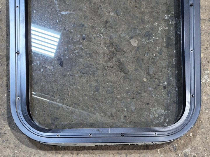 Used Black Radius Non Opening Window : 17 1/4" W x 21 1/2" H x 1 3/4" - Young Farts RV Parts