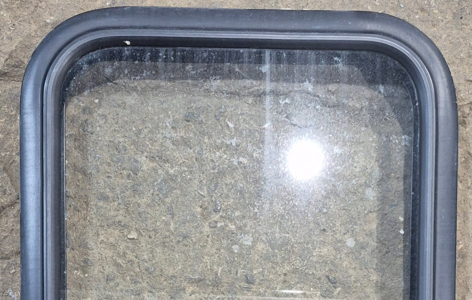 Used Black Radius Non Opening Window : 17 1/4" W x 21 1/2" H x 1 7/8" - Young Farts RV Parts