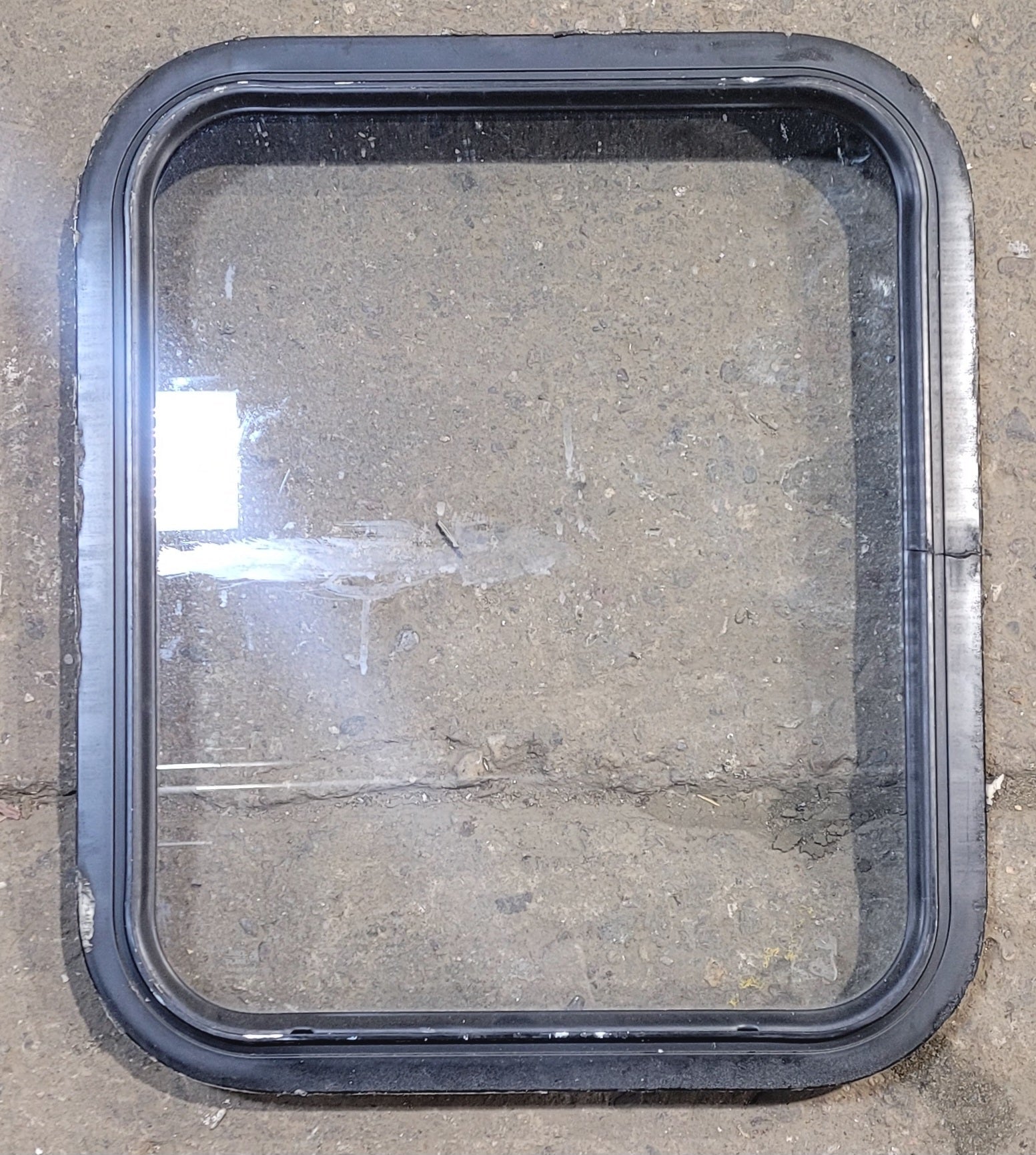 Used Black Radius Non Opening Window : 18 1/4" W x 21 3/4" H x 1 3/4" - Young Farts RV Parts