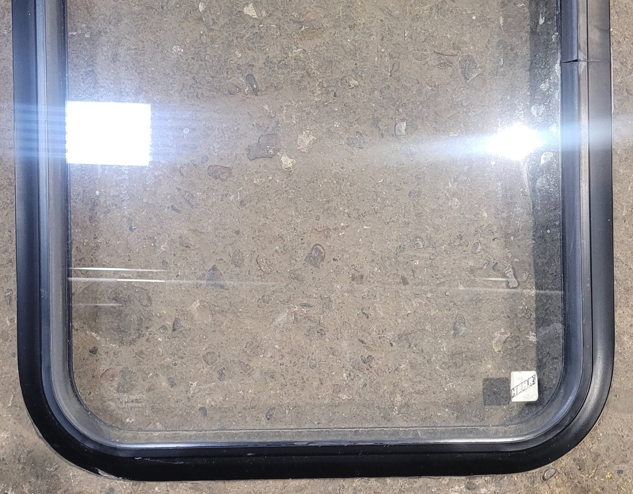 Used Black Radius Non Opening Window : 18 1/4" W x 25 3/4" H x 1 3/4" - Young Farts RV Parts