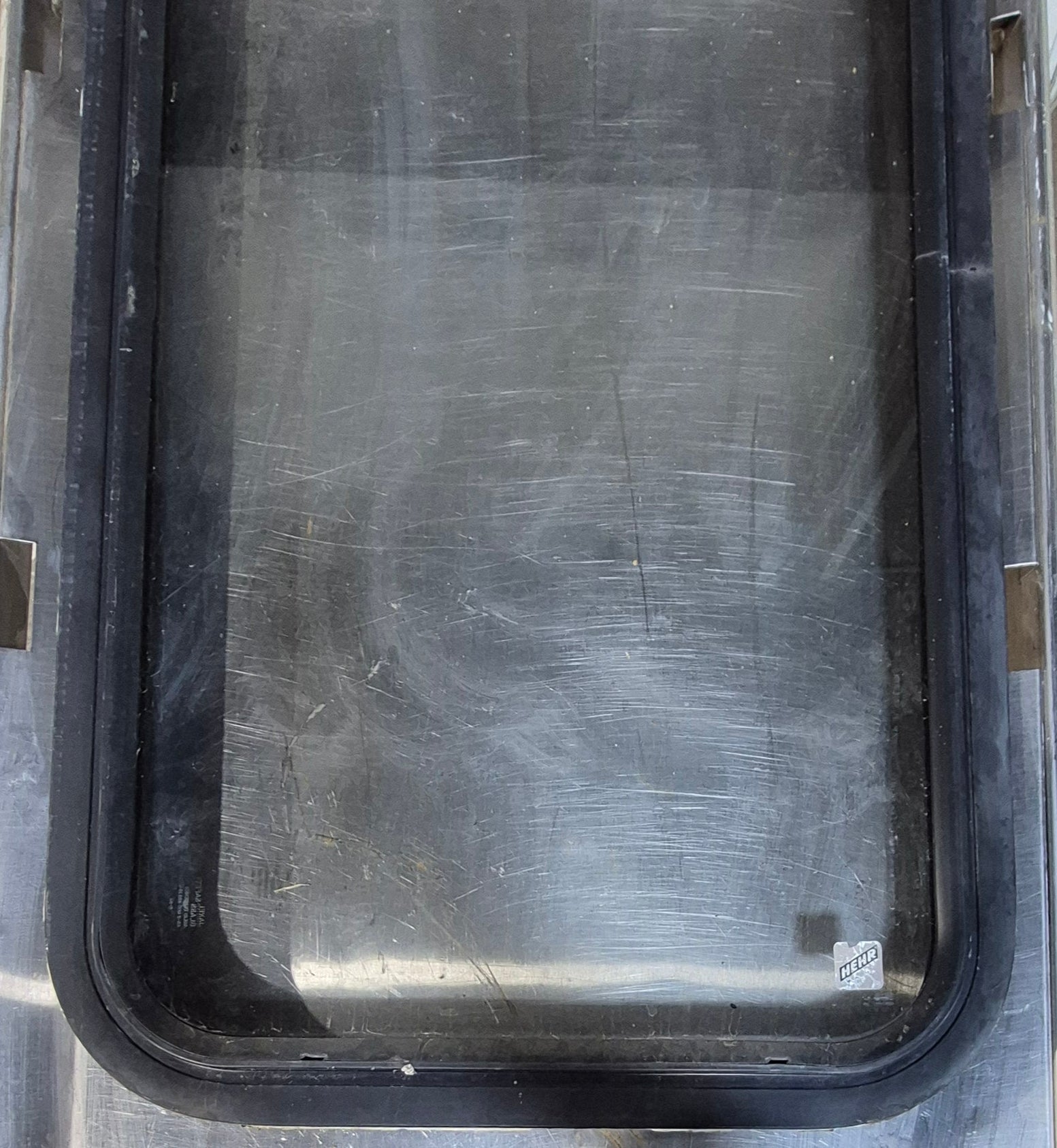 Used Black Radius Non Opening Window : 18 1/4" W x 35 3/4" H x 1 3/4" - Young Farts RV Parts