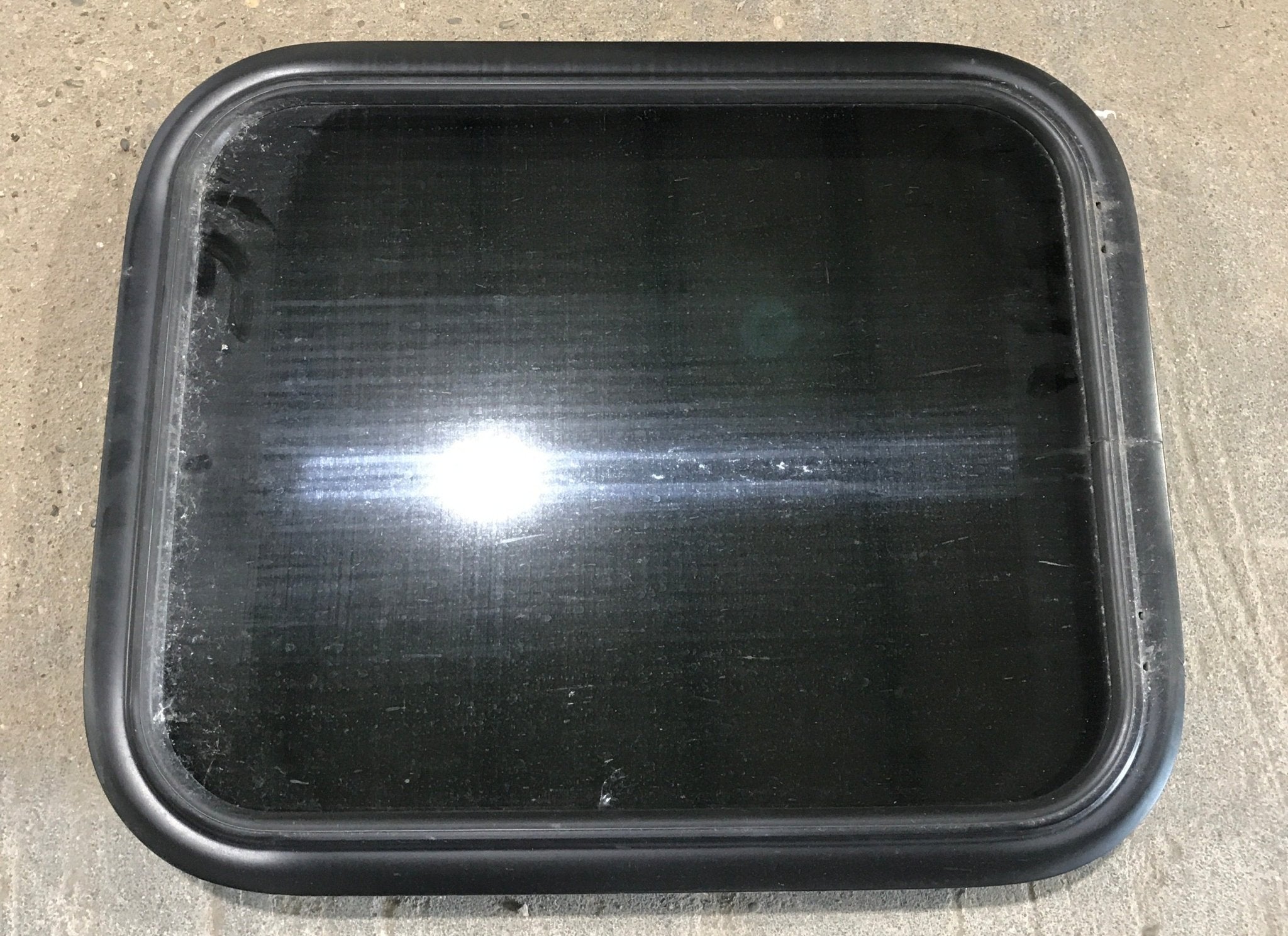 Used Black Radius Non Opening Window : 21 1/2" W x 17 1/2" H x 1 7/8" - Young Farts RV Parts
