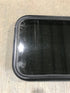 Used Black Radius Non Opening Window : 21 1/2" W x 17 1/2" H x 1 7/8" - Young Farts RV Parts