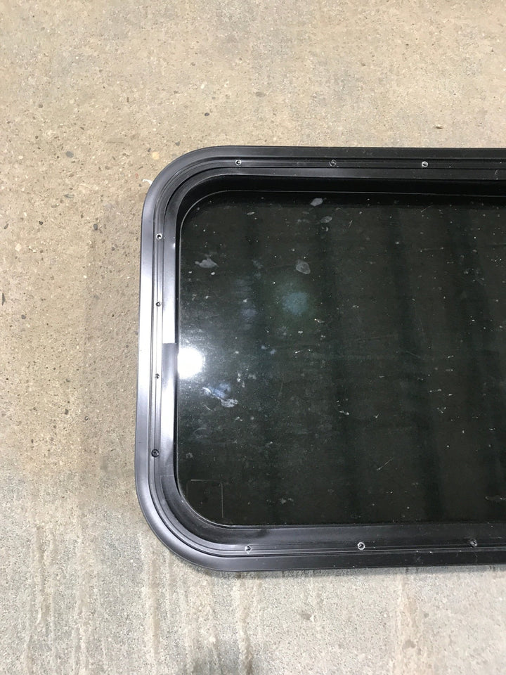 Used Black Radius Non Opening Window : 21 1/2" W x 17 1/2" H x 1 7/8" - Young Farts RV Parts