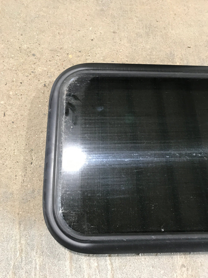 Used Black Radius Non Opening Window : 21 1/2" W x 17 1/2" H x 1 7/8" - Young Farts RV Parts