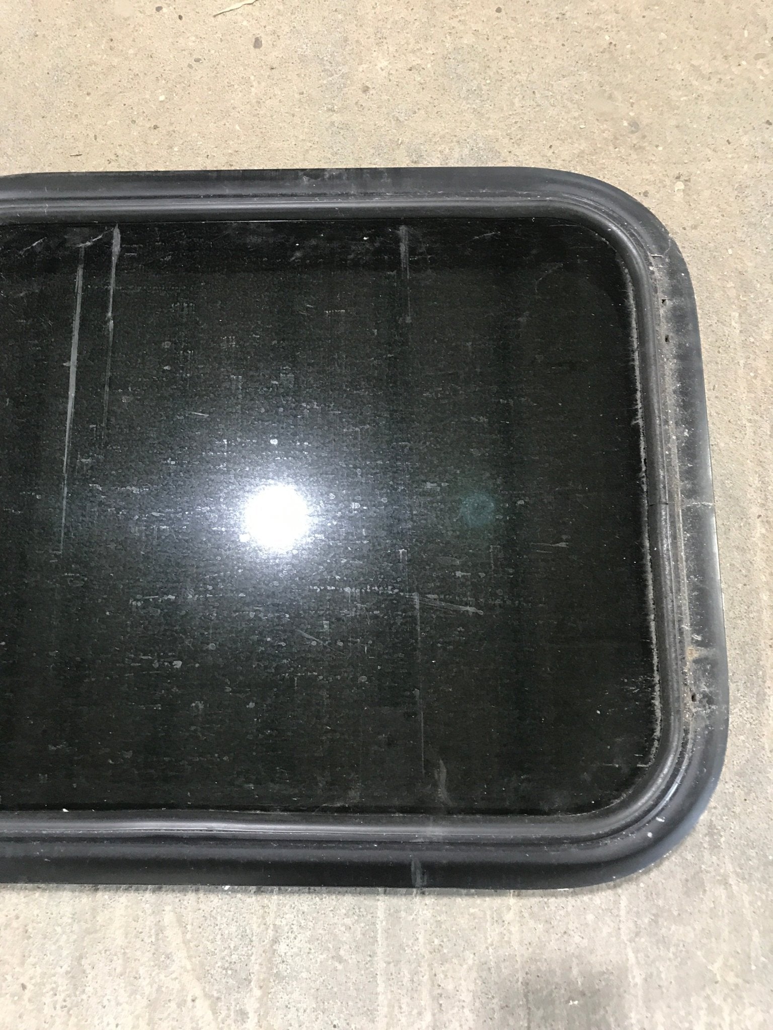 Used Black Radius Non Opening Window : 21 1/2" W x 17 1/2" H x 1 7/8" - Young Farts RV Parts