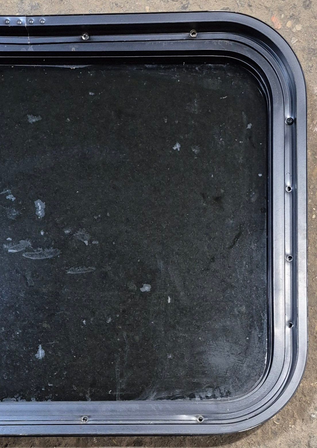 Used Black Radius Non Opening Window : 23 1/2
