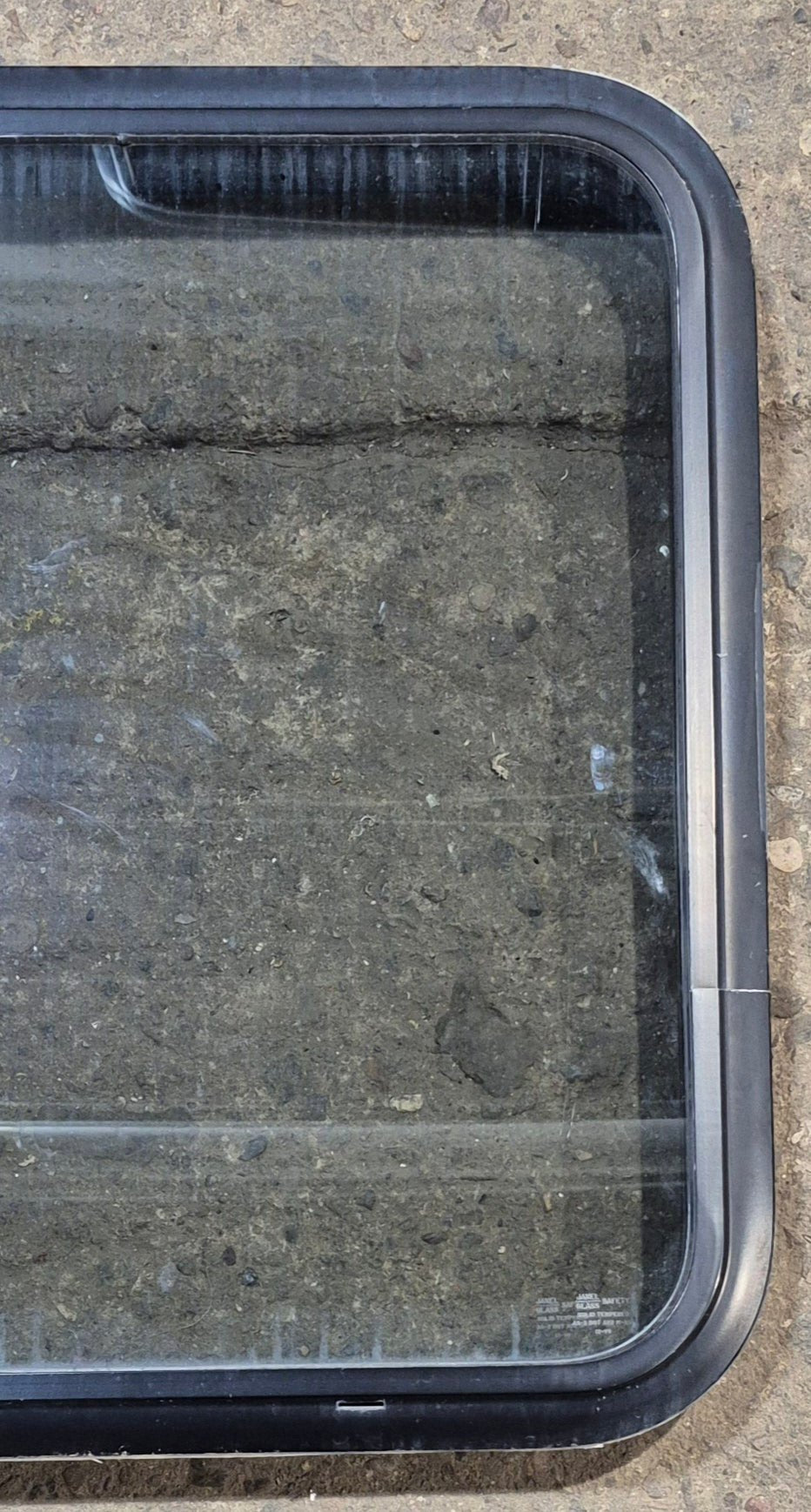 Used Black Radius Non Opening Window : 23 3/4" W x 26" H x 2" D - Young Farts RV Parts