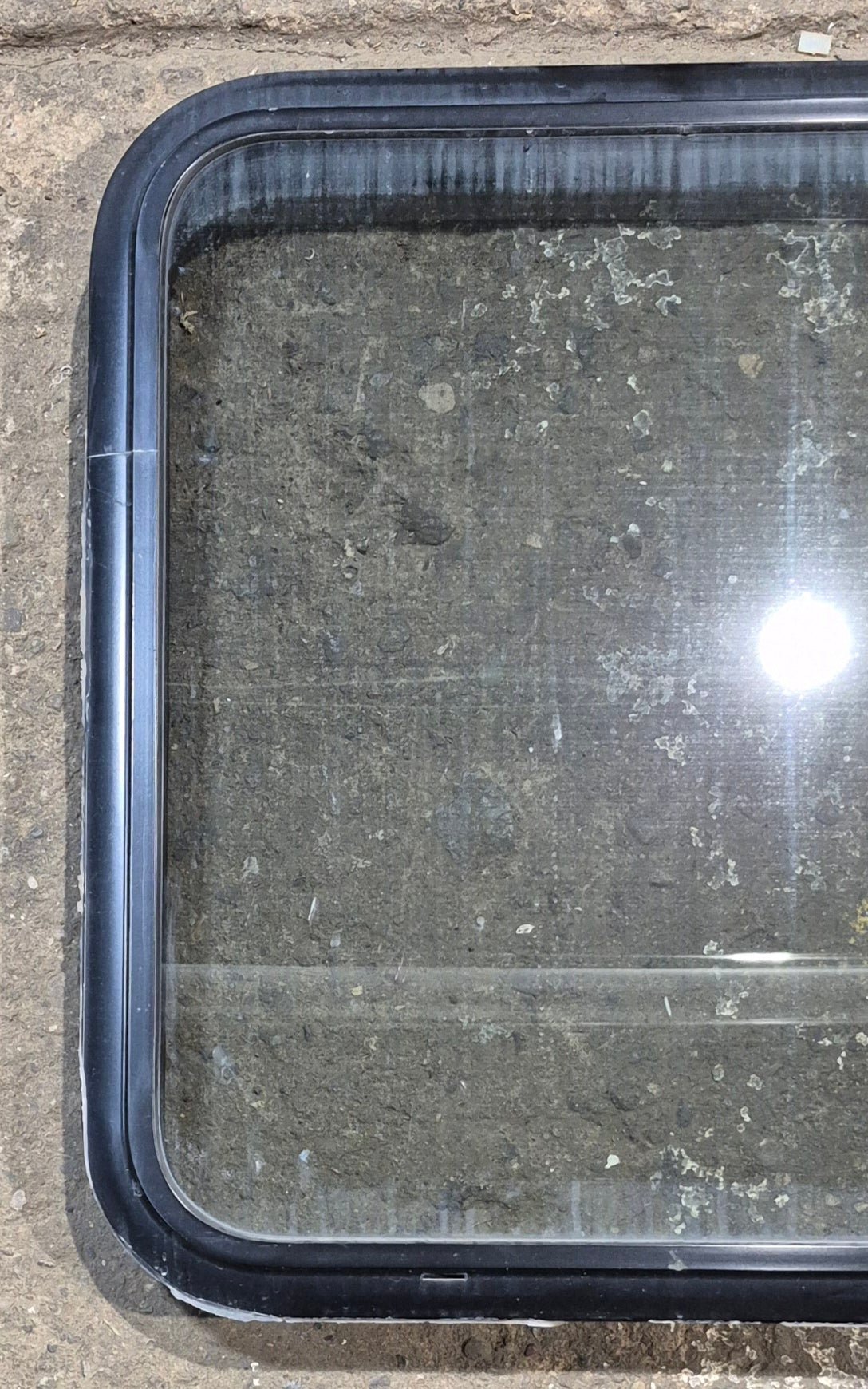 Used Black Radius Non Opening Window : 23 3/4" W x 26" H x 2" D - Young Farts RV Parts