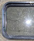 Used Black Radius Non Opening Window : 24 1/4" W x 16 3/4" H x 1 7/8" - Young Farts RV Parts