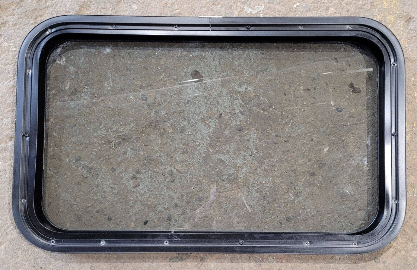 Used Black Radius Non Opening Window : 29 1/2" W x 17 1/2" H x 1 7/8" D - Young Farts RV Parts