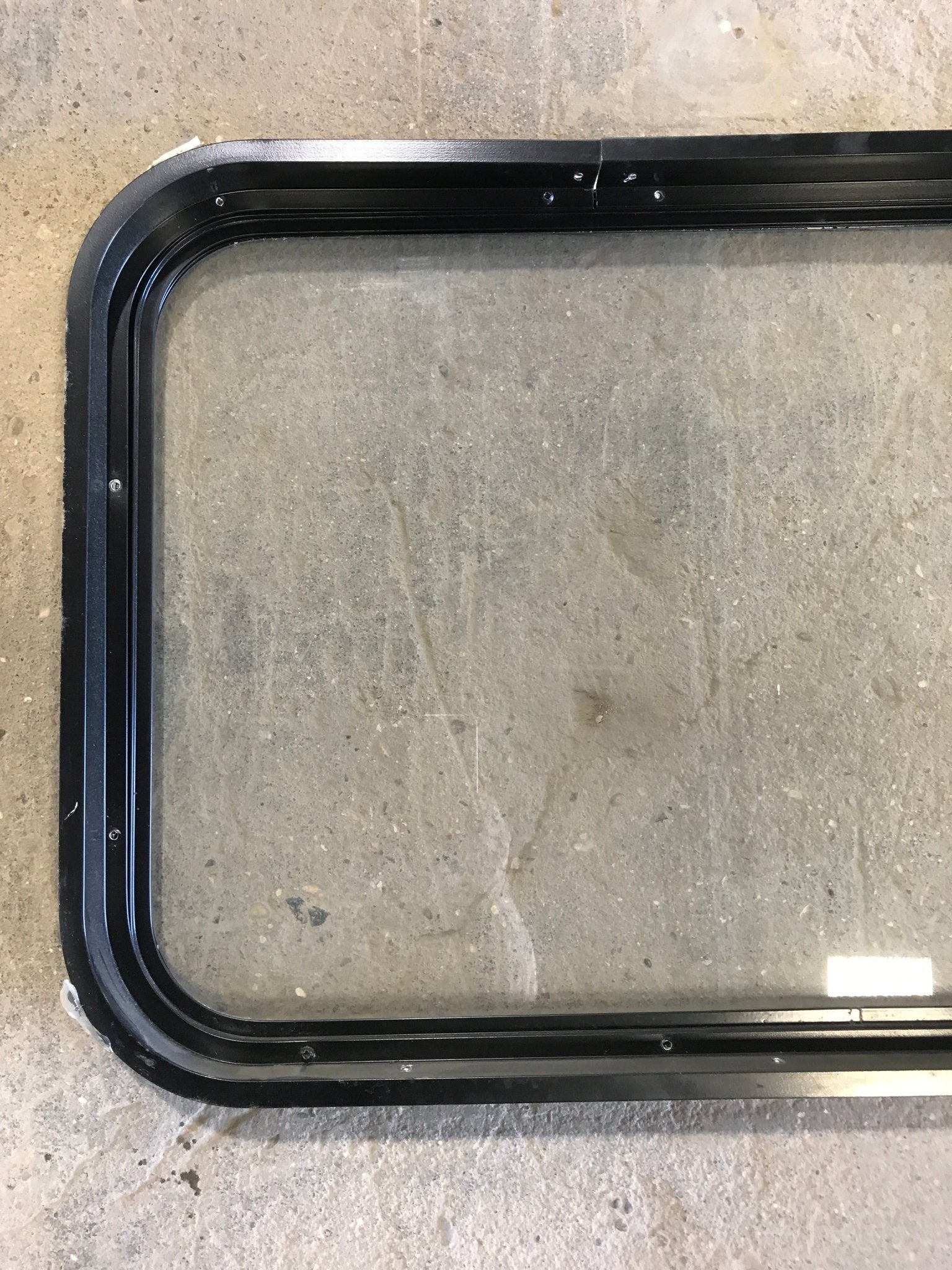Used Black Radius Non - Opening Window : 32" W X 19 1/2" H X 2" D - Young Farts RV Parts
