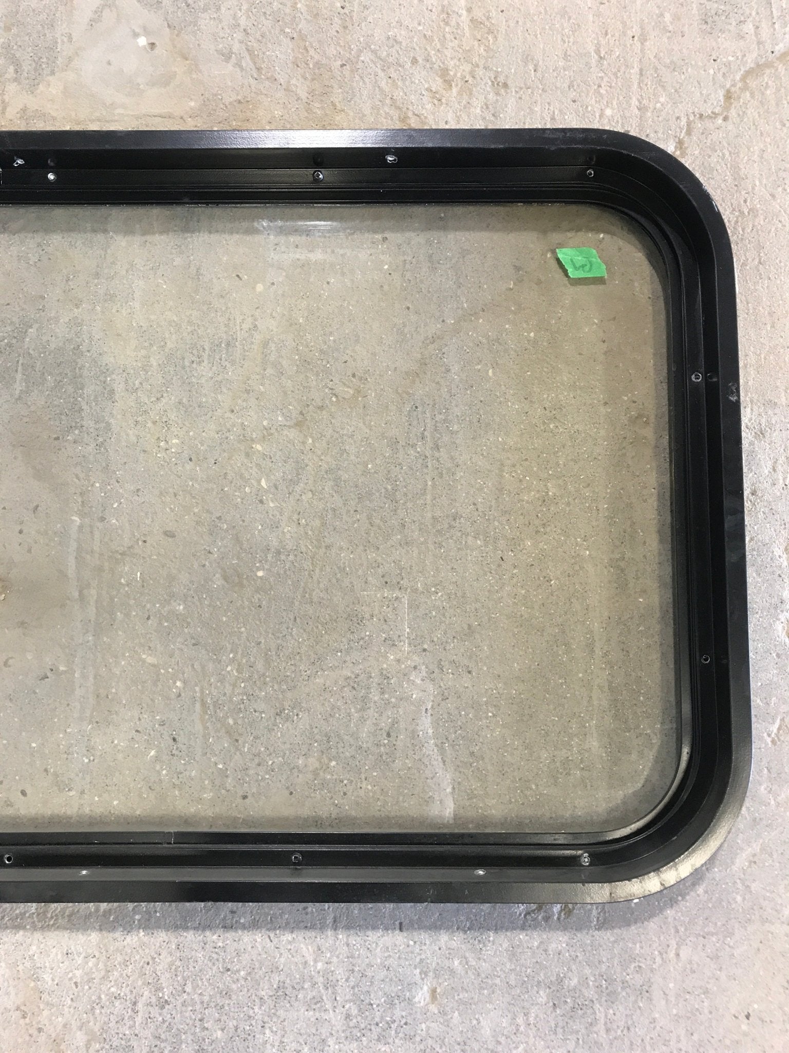 Used Black Radius Non - Opening Window : 32" W X 19 1/2" H X 2" D - Young Farts RV Parts