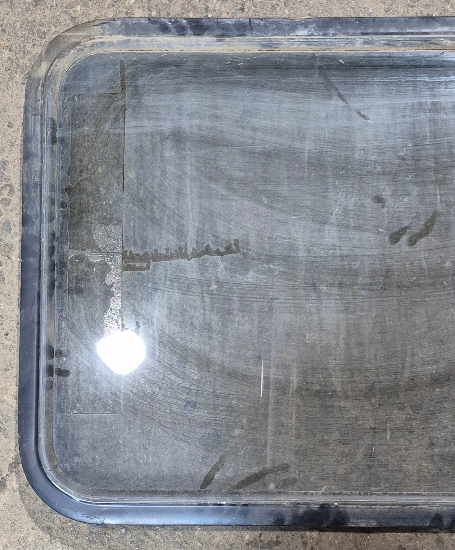 Used Black Radius Non - Opening Window : 34 1/4 x 23 1/4 x 1 1/2" D - Young Farts RV Parts