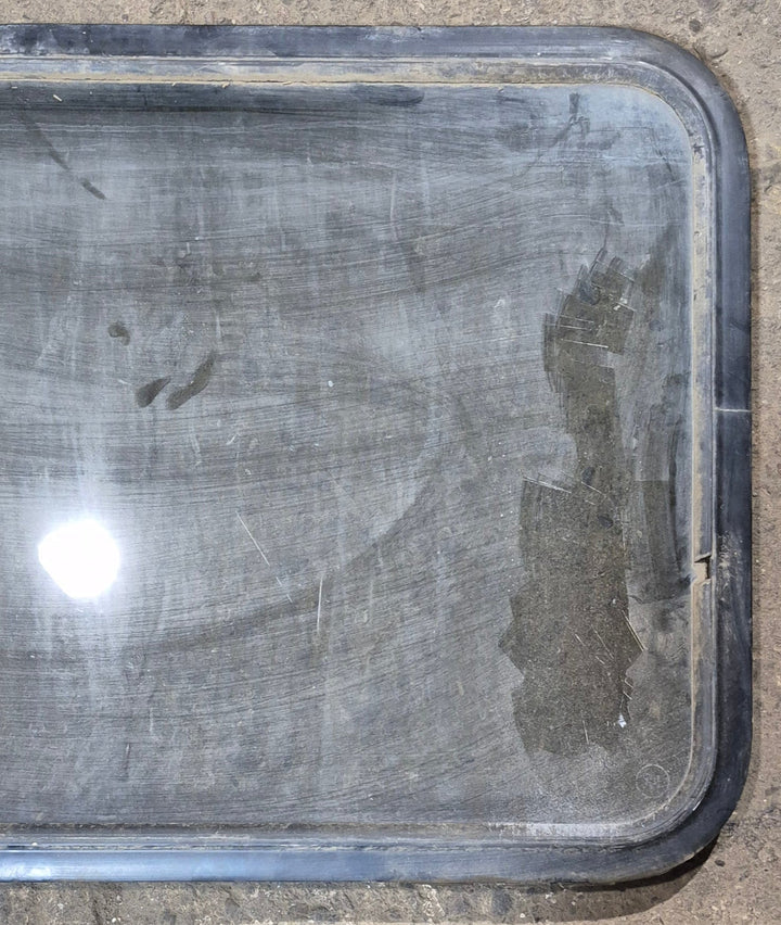 Used Black Radius Non - Opening Window : 34 1/4 x 23 1/4 x 1 1/2" D - Young Farts RV Parts