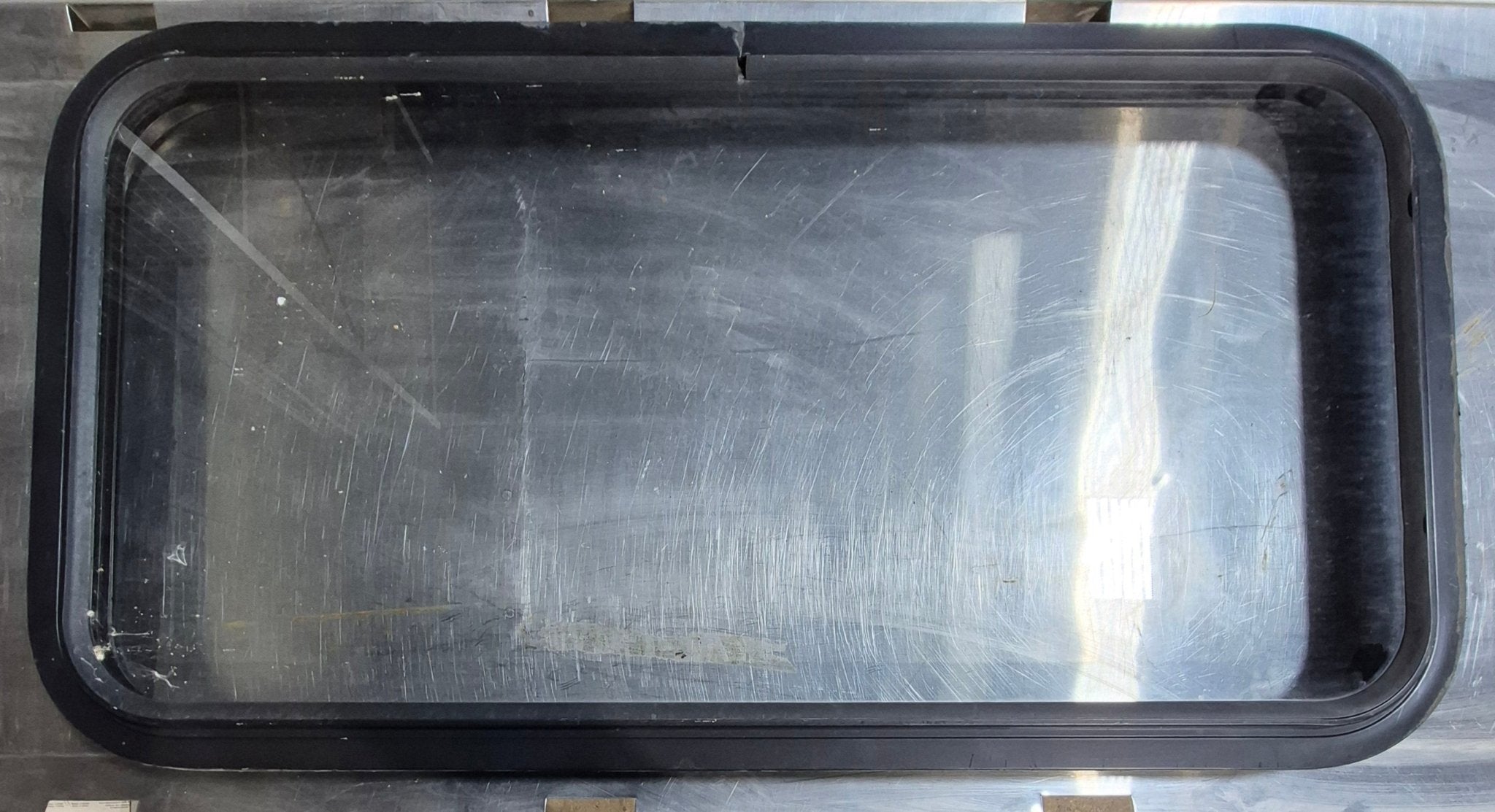 Used Black Radius Non Opening Window : 35 3/4" W x 18 1/4" H x 1 3/4" - Young Farts RV Parts