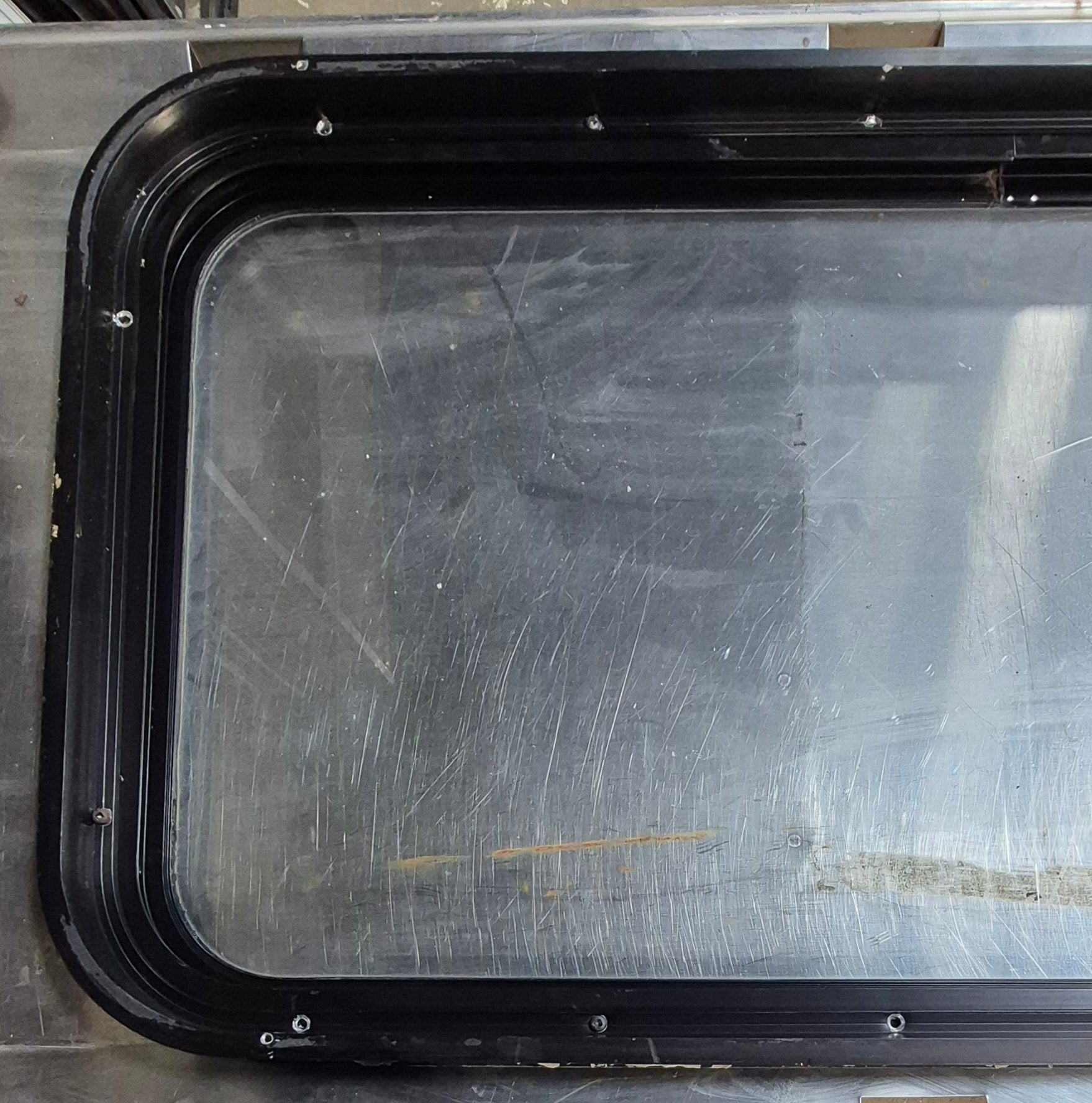 Used Black Radius Non Opening Window : 35 3/4" W x 18 1/4" H x 1 3/4" - Young Farts RV Parts