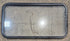Used Black Radius Non Opening Window : 41 1/2" W x 21 1/2" H x 1 1/2" - Young Farts RV Parts
