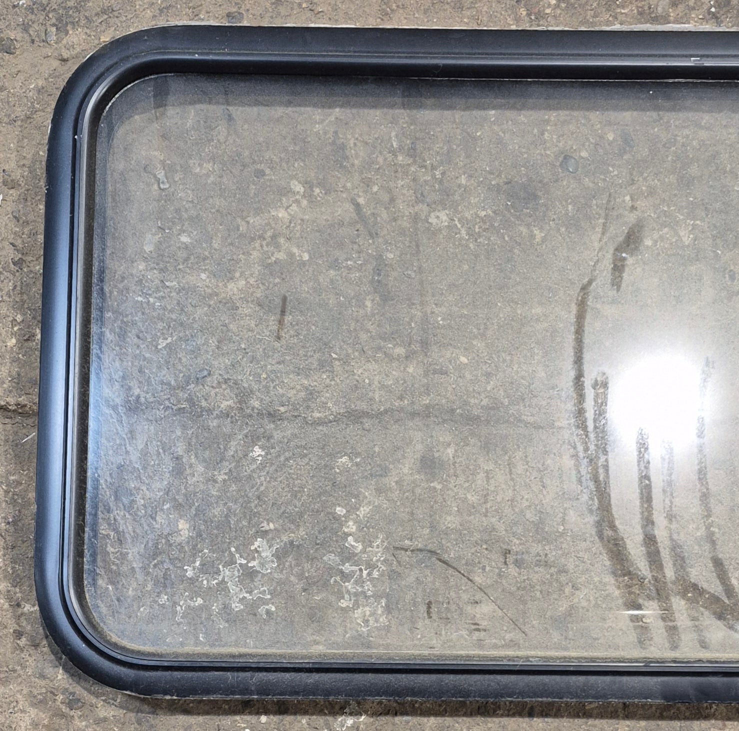 Used Black Radius Non Opening Window : 41 1/2" W x 21 1/2" H x 1 1/2" - Young Farts RV Parts