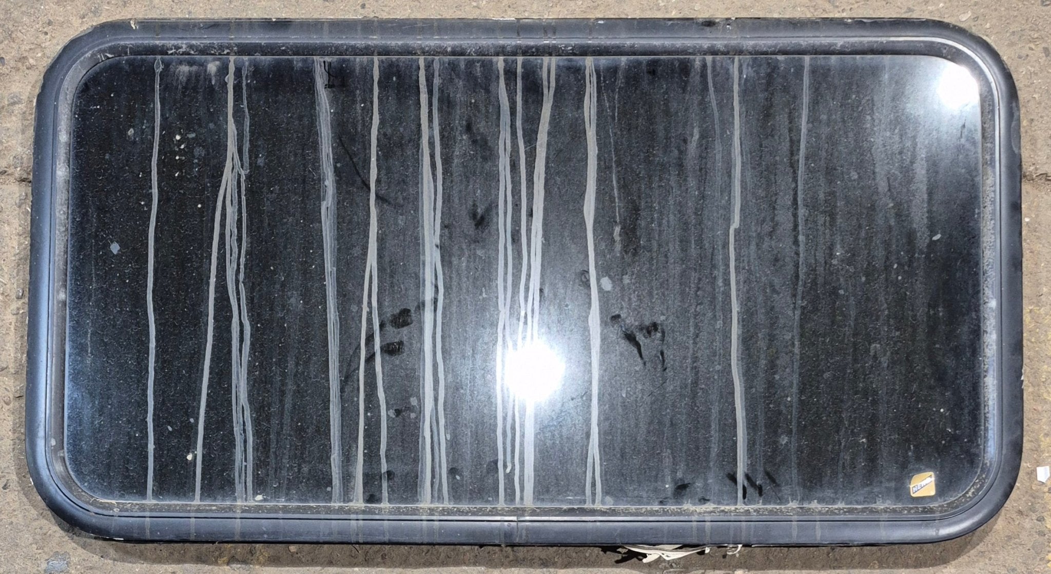 Used Black Radius Non Opening Window : 41 1/4" W x 21 1/4" H x 2" - Young Farts RV Parts