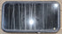 Used Black Radius Non Opening Window : 41 1/4" W x 21 1/4" H x 2" - Young Farts RV Parts