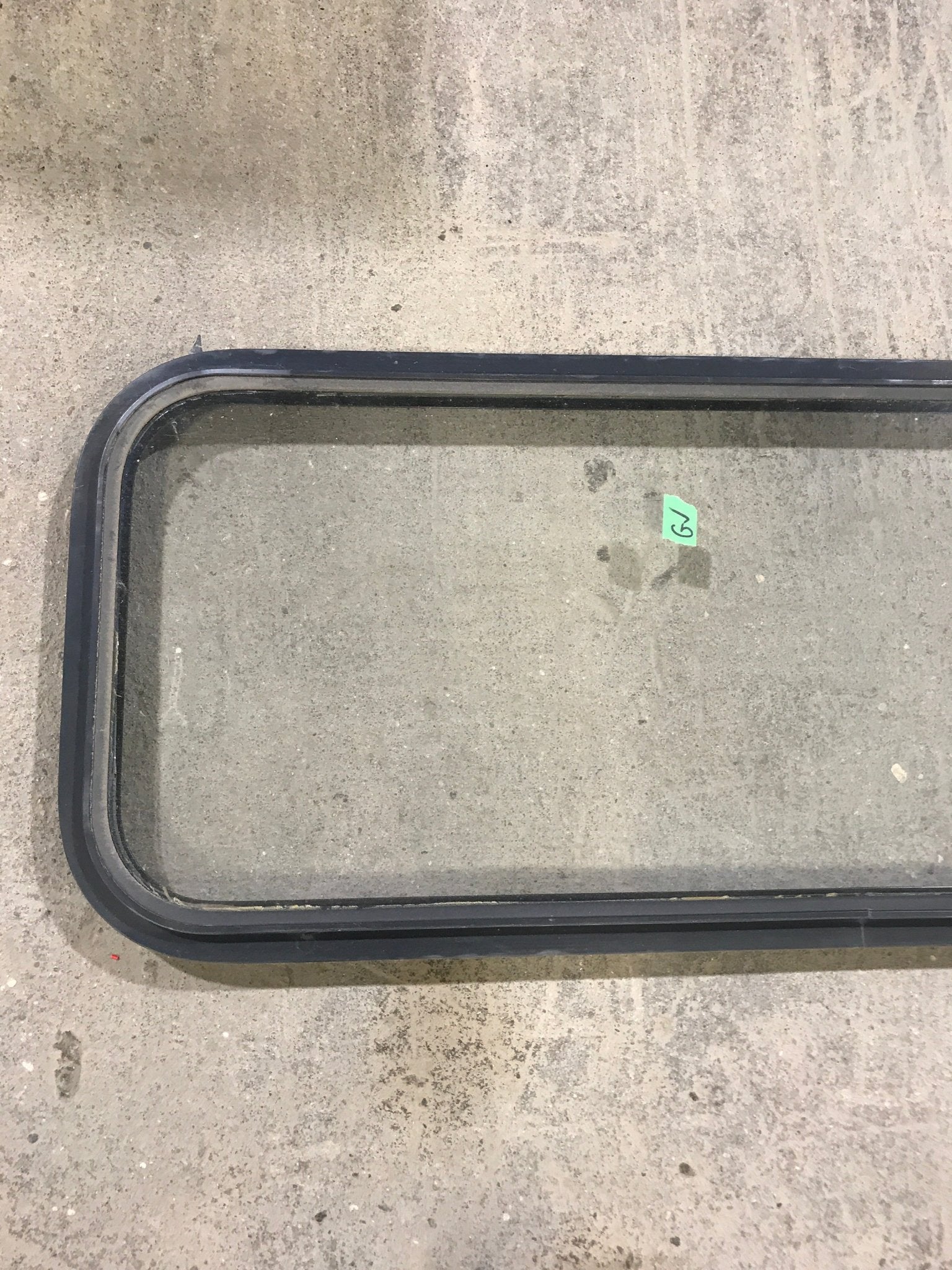 Used Black Radius Non Opening Window : 41 3/4" W x 14 3/4" H x 1 1/2" D - Young Farts RV Parts