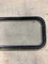 Used Black Radius Non Opening Window : 41 3/4" W x 14 3/4" H x 1 1/2" D - Young Farts RV Parts
