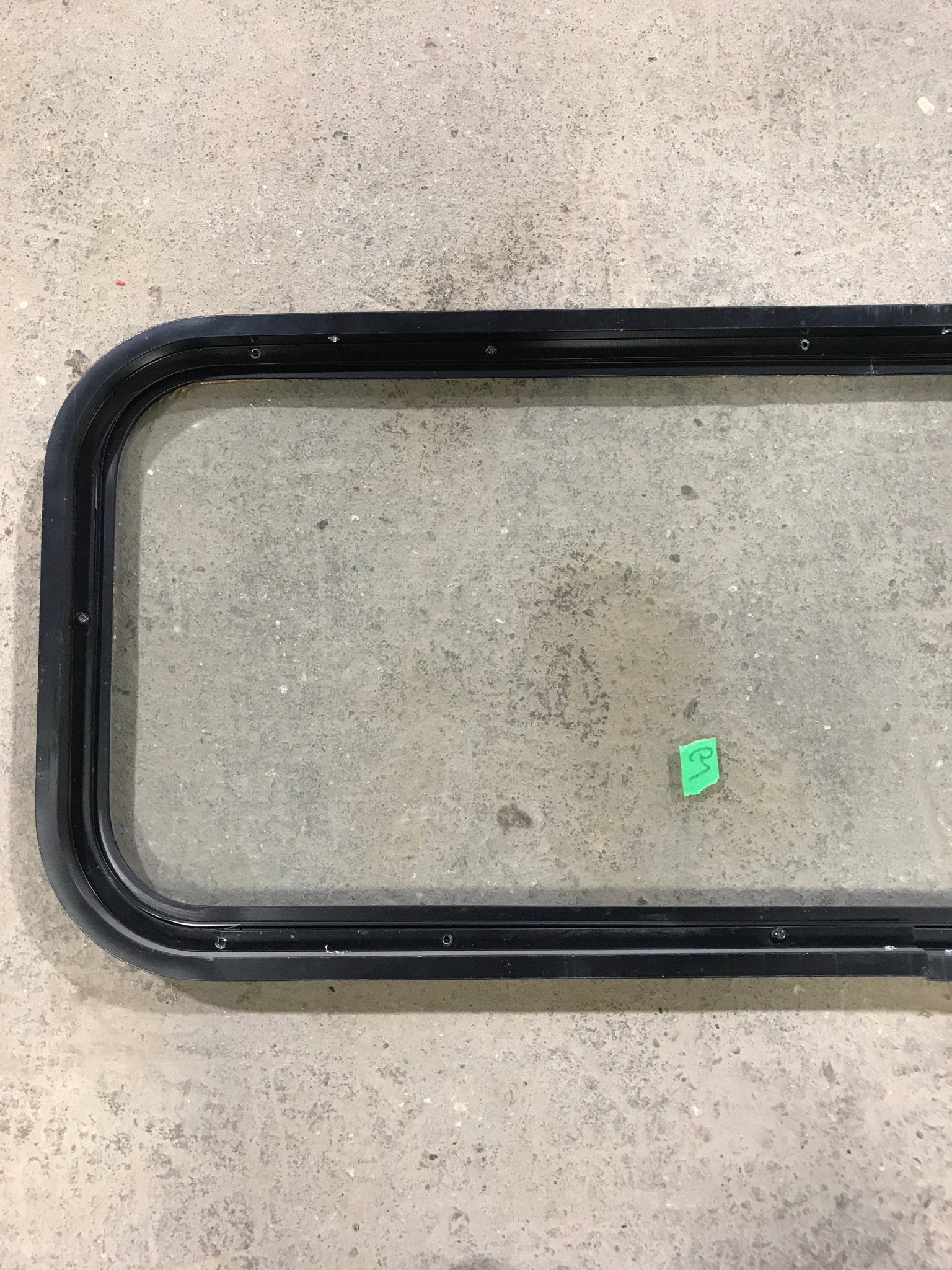 Used Black Radius Non Opening Window : 41 3/4" W x 14 3/4" H x 1 1/2" D - Young Farts RV Parts