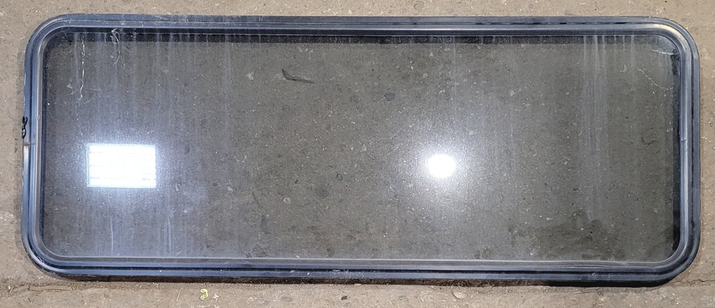 Used Black Radius Non Opening Window : 57 1/2" W x 21 1/2" H x 1 1/4" - Young Farts RV Parts