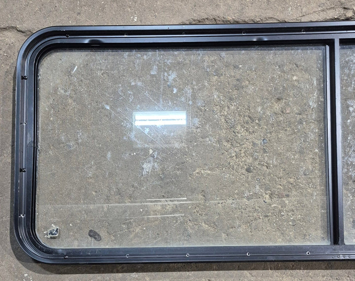 Used Black Radius Non Opening Window : 60 1/4" W x 21 3/4" H x 1 5/8" D - Young Farts RV Parts