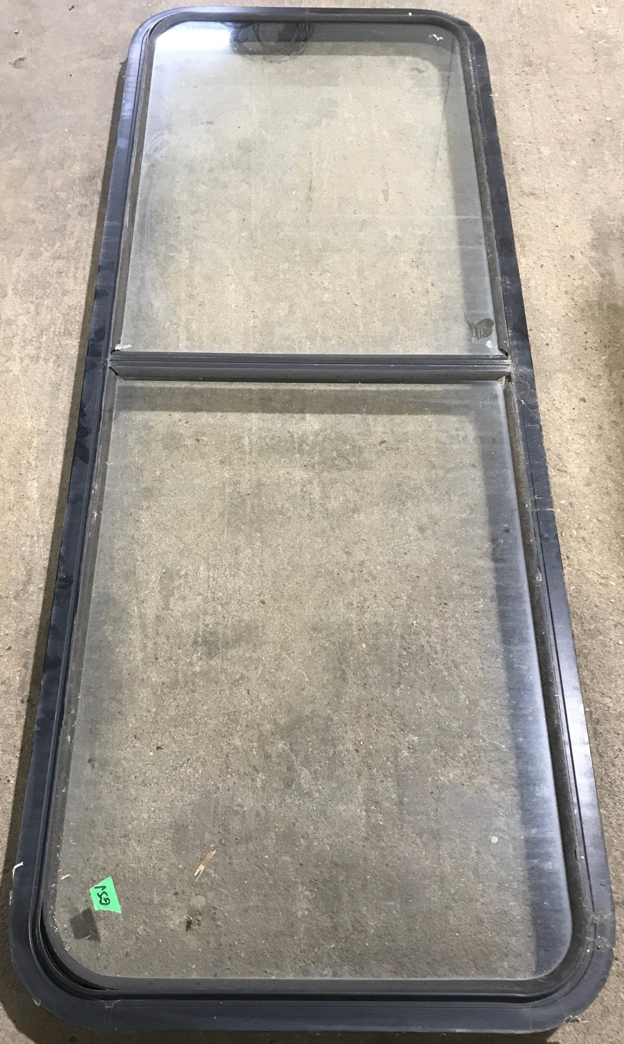 Used Black Radius Non Opening Window : 60 1/4" W x 21 3/4" H x 1 7/8" D - Young Farts RV Parts